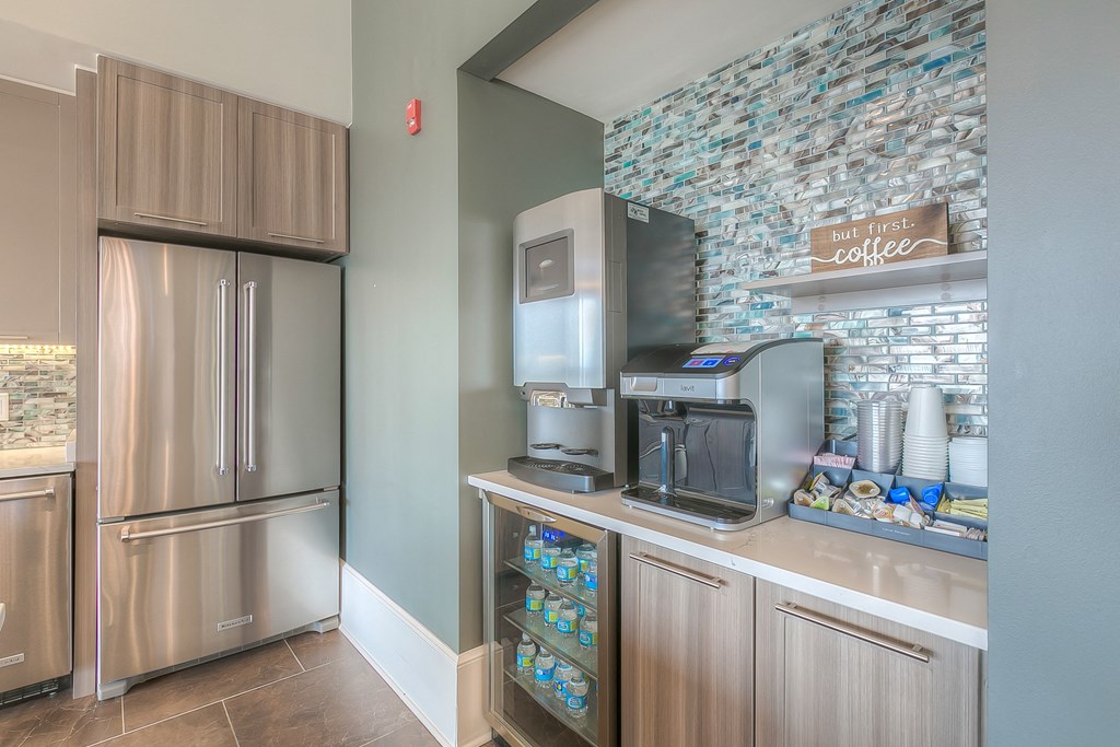 community coffee bar with a sparkling water machine  at Waterside Residences on Quivira, Kansas