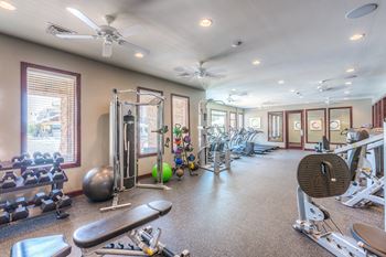 24-Hour Fitness Center with Yoga Studio and Group Fitness Classes
