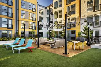 a rendering of an outdoor patio at an apartment building