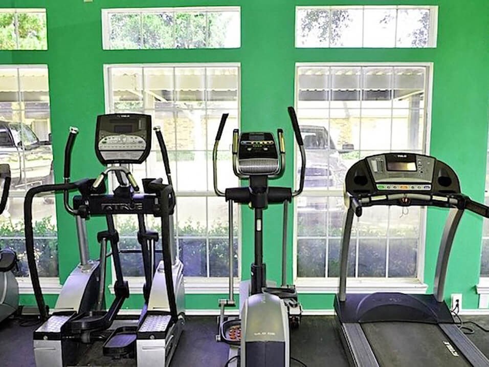 fitness center at apartment complex 