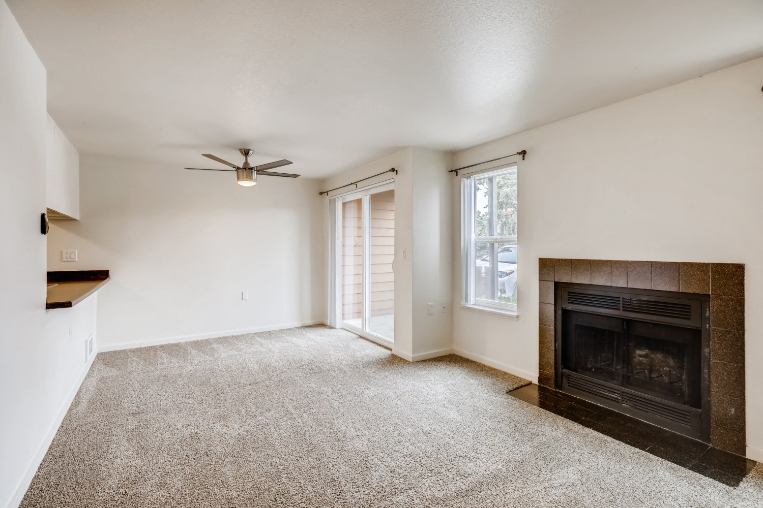 A Standard Living Room with a Fireplace at The Courtyard at South Station