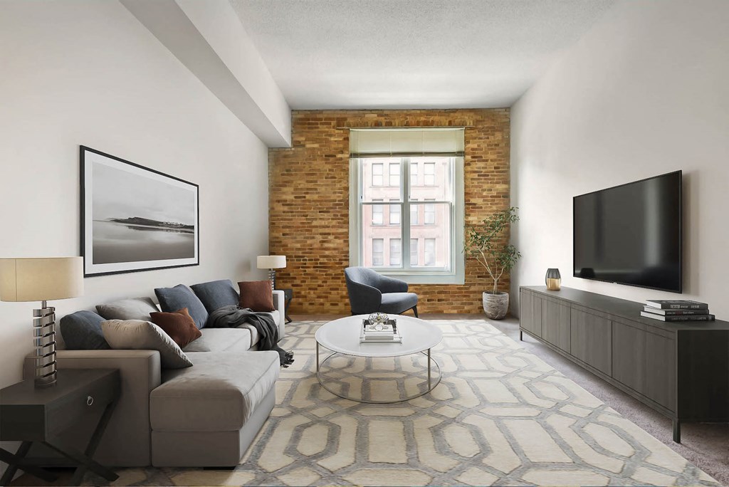 a living room with a couch and a tv