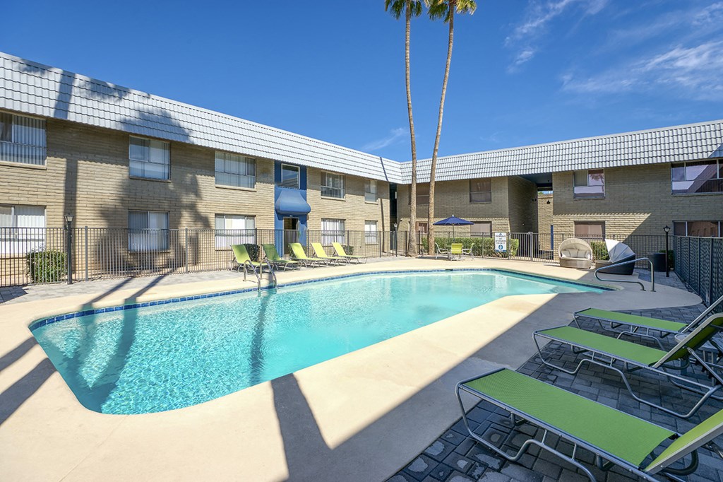 our apartments have a large pool and lounge chairs