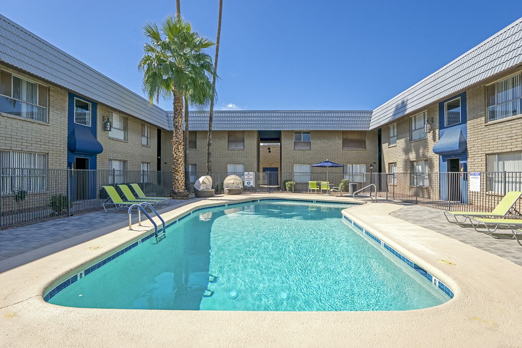 our apartments offer a swimming pool with a palm tree
