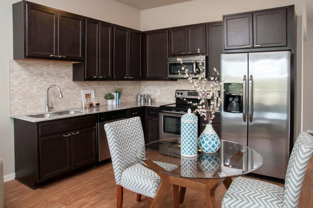 Well Equipped Kitchen And Dining at Overlook on the Creek, Minnetonka, MN