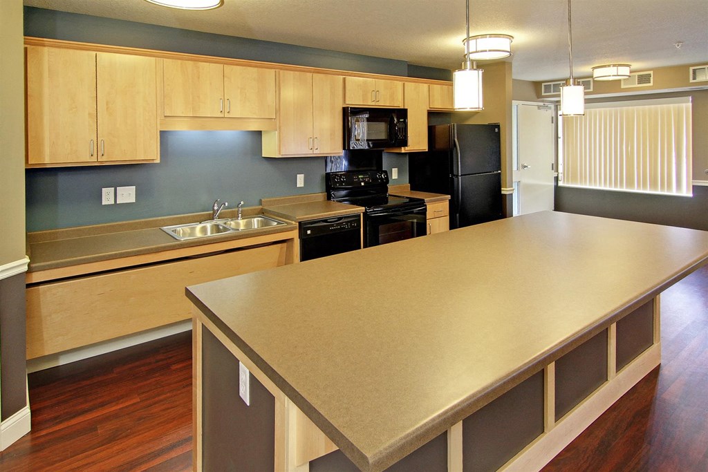 a kitchen with a large counter top