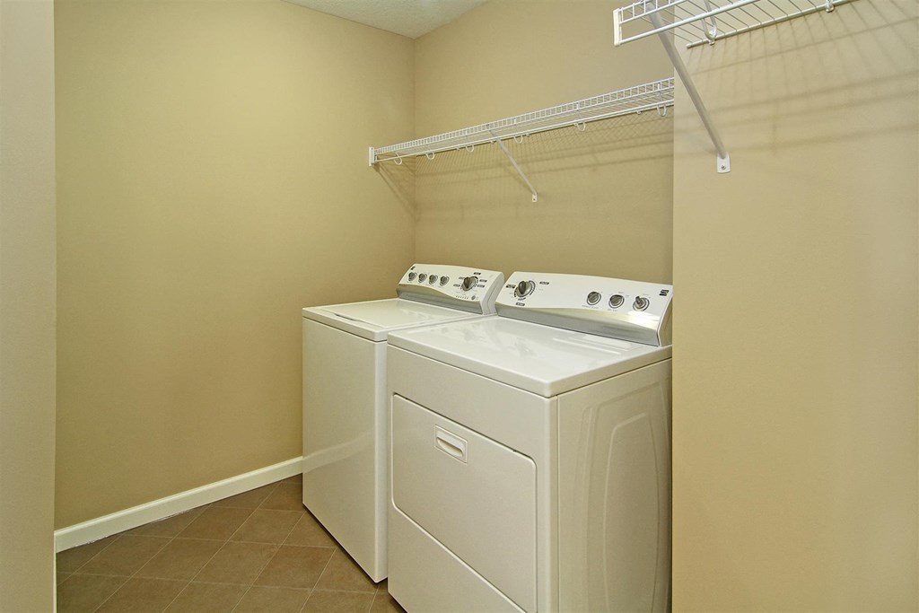 a washer and dryer in the laundry room of a home