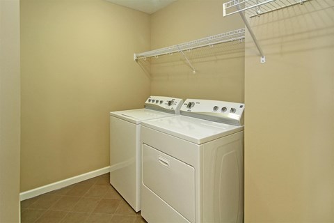 a washer and dryer in the laundry room of a home