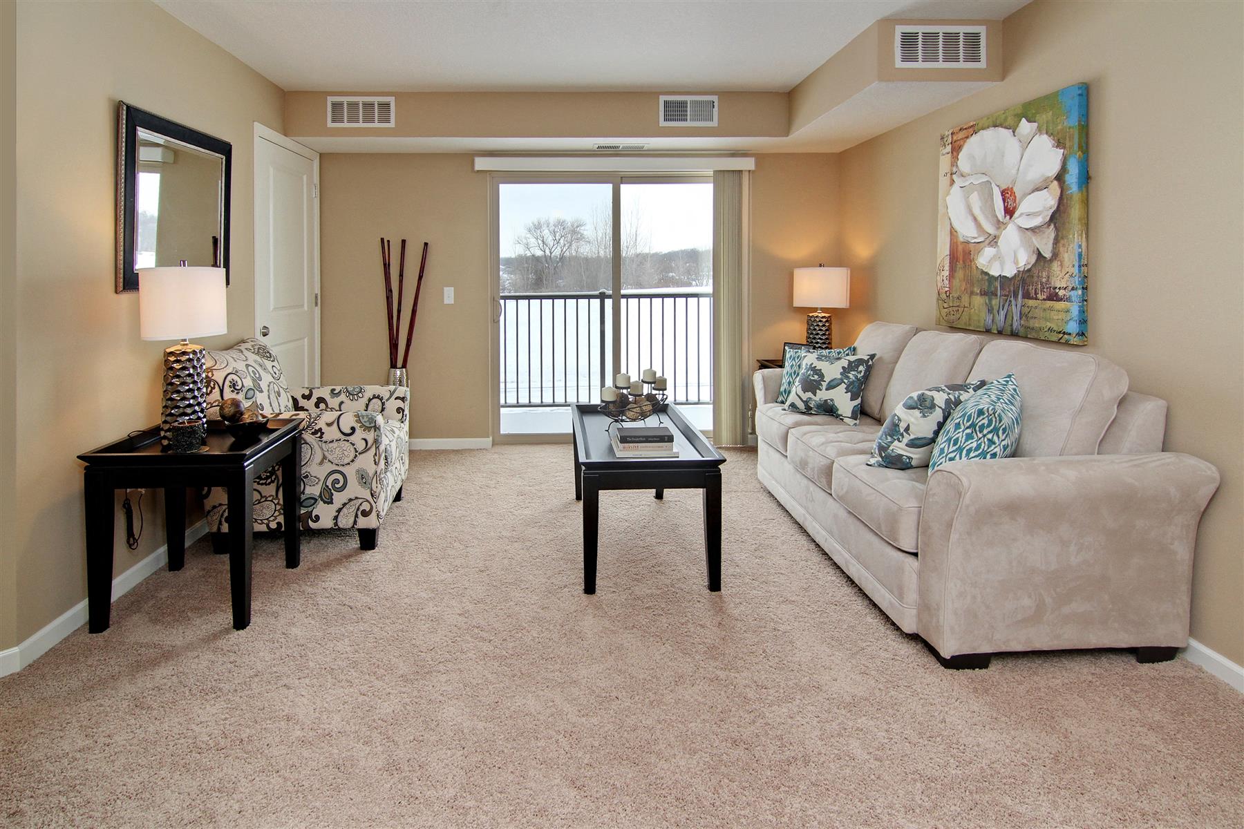 a living room with a couch and a table