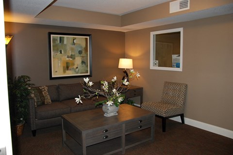 a living room with a couch and a table