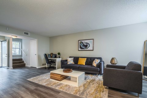 a living room with a couch and a coffee table