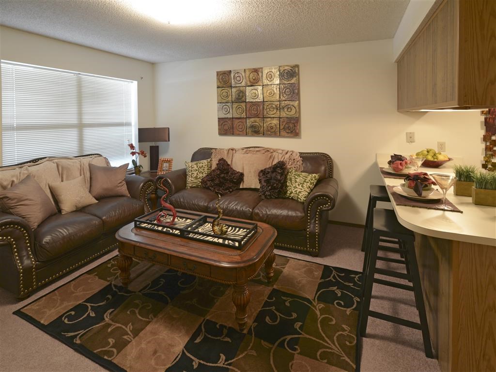 a living room with a couch and a table