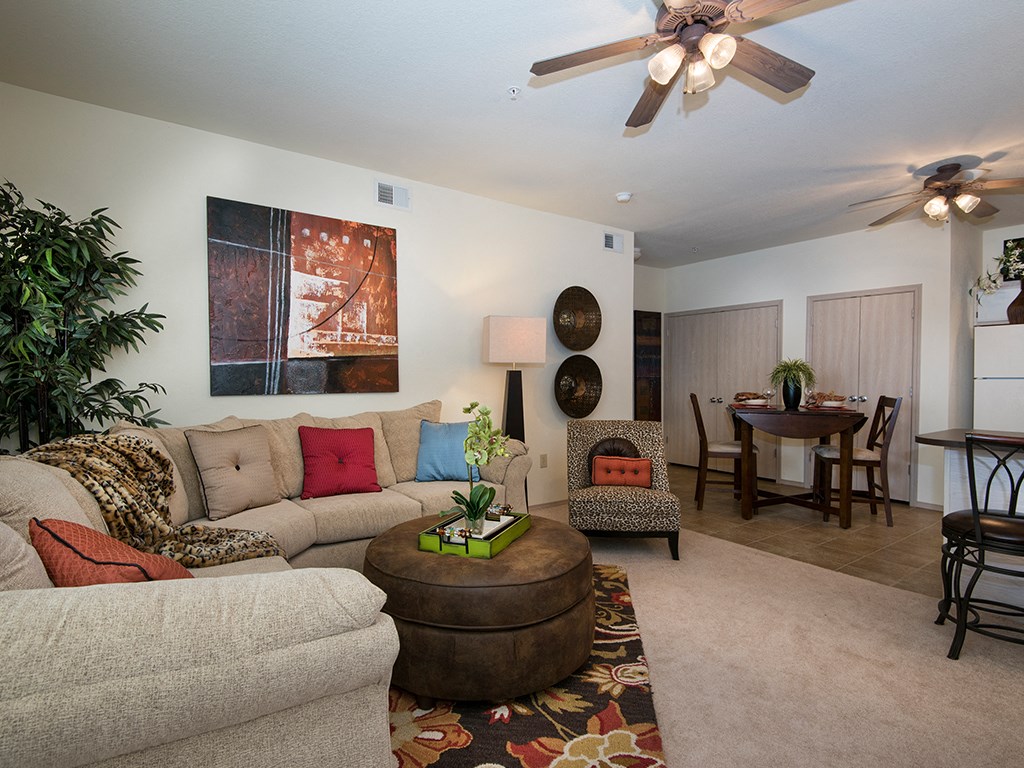 a living room with a couch and a table