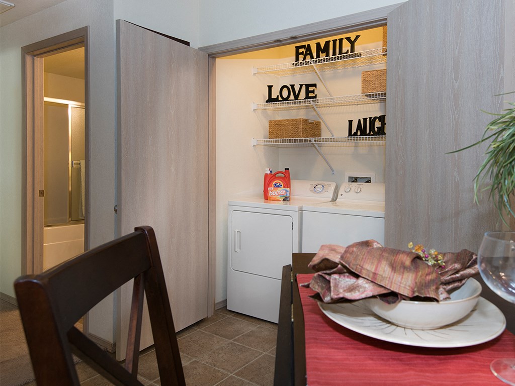 a table with a plate of food on it in a kitchen
