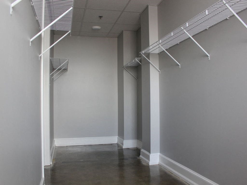 oversized closet with built-in wire shelving at Thomas Jefferson Tower, Alabama