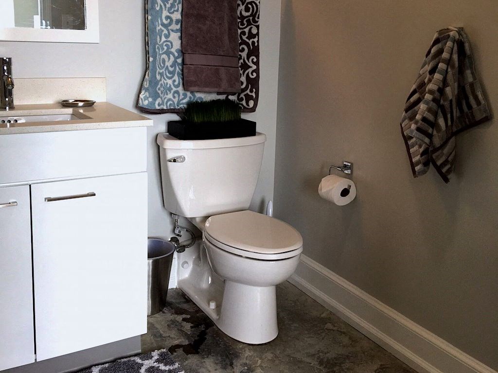 bathroom with quartz countertops at Thomas Jefferson Tower, Alabama, 35203