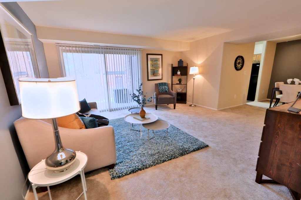 a living room with a couch and a table