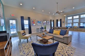 a living room with a couch and a table
