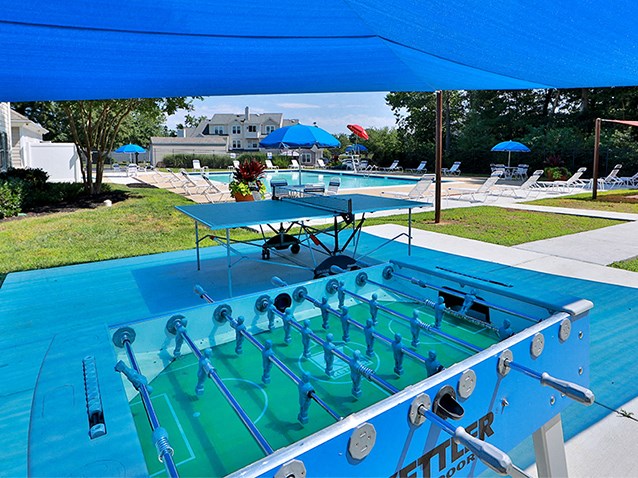 the pool is equipped with a ping pong table