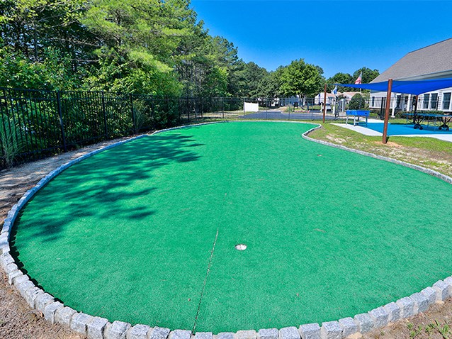 a large pool with a golf ball in the middle of it