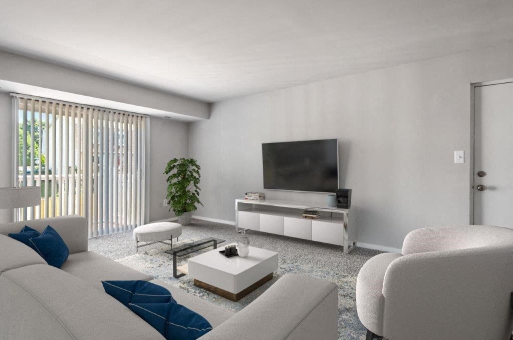 a living room with a couch and a television