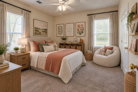 A bedroom with a large bed, a window with curtains, and a ceiling fan.