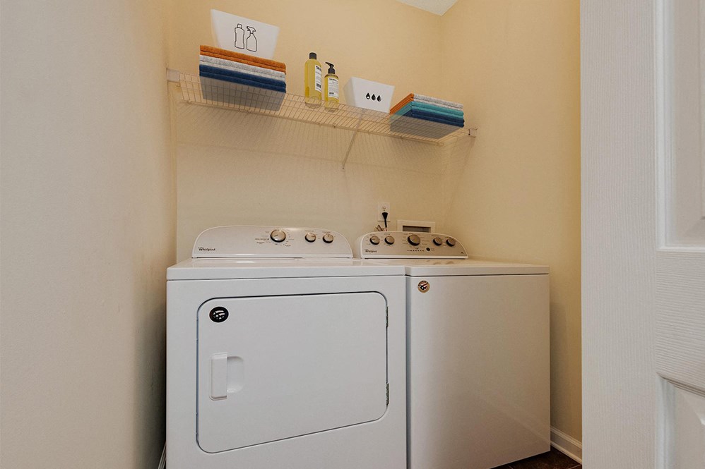 a washer and dryer in the laundry room of a home