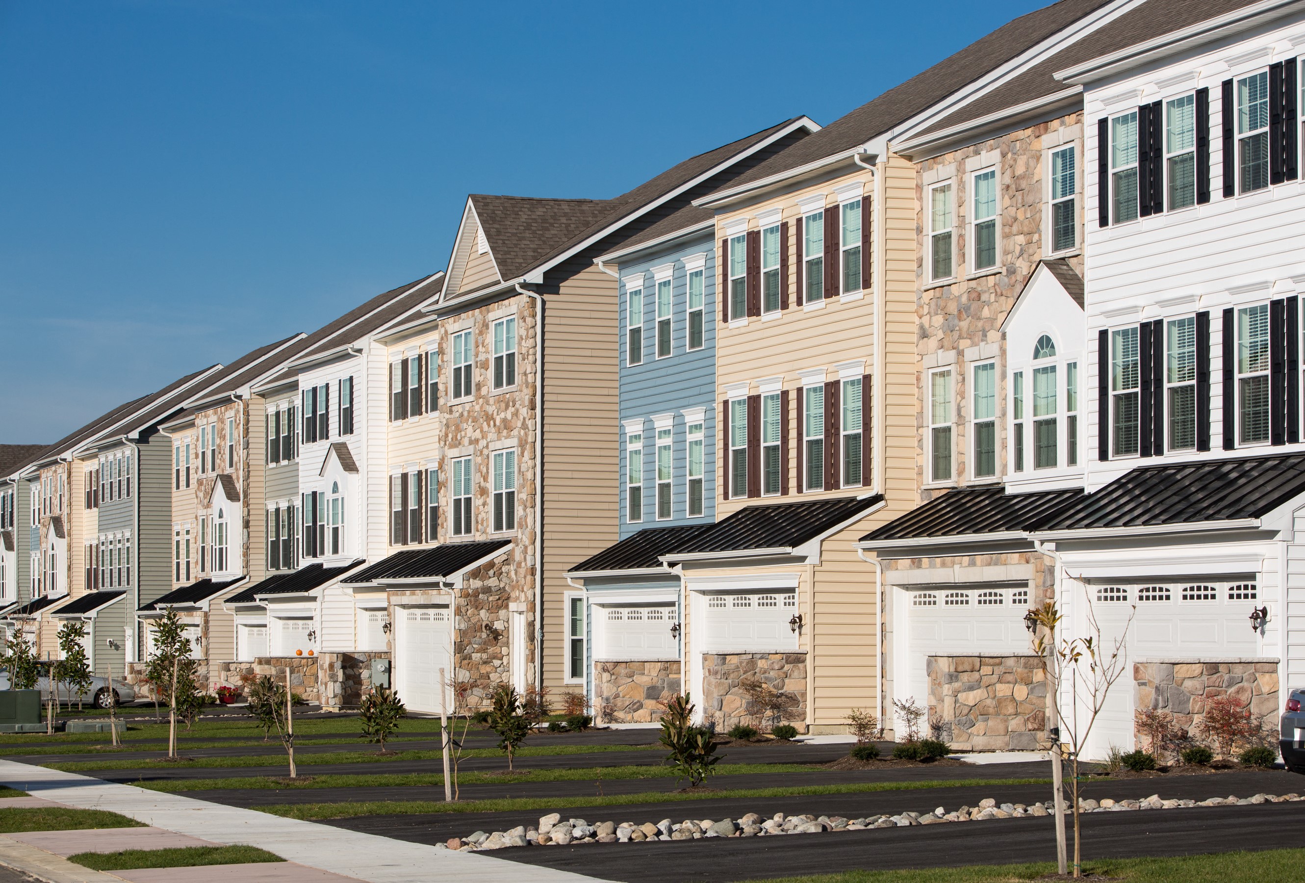 a row of town houses on a street