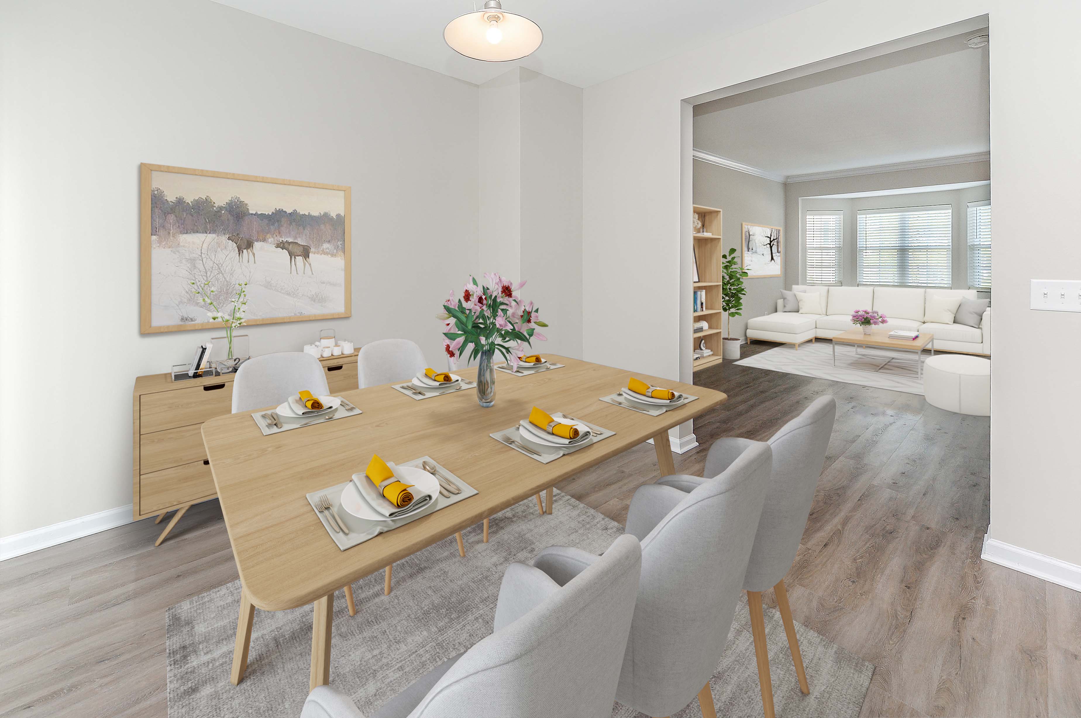 a dining room with a wooden table and chairs