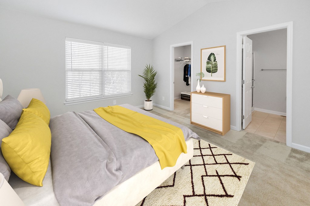 a bedroom with a bed and a closet