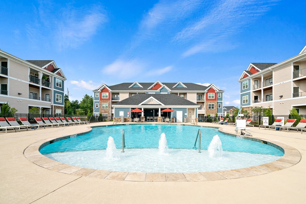 Amenities Highlight Saltwater Swimming Pool With Expansive Sundeck