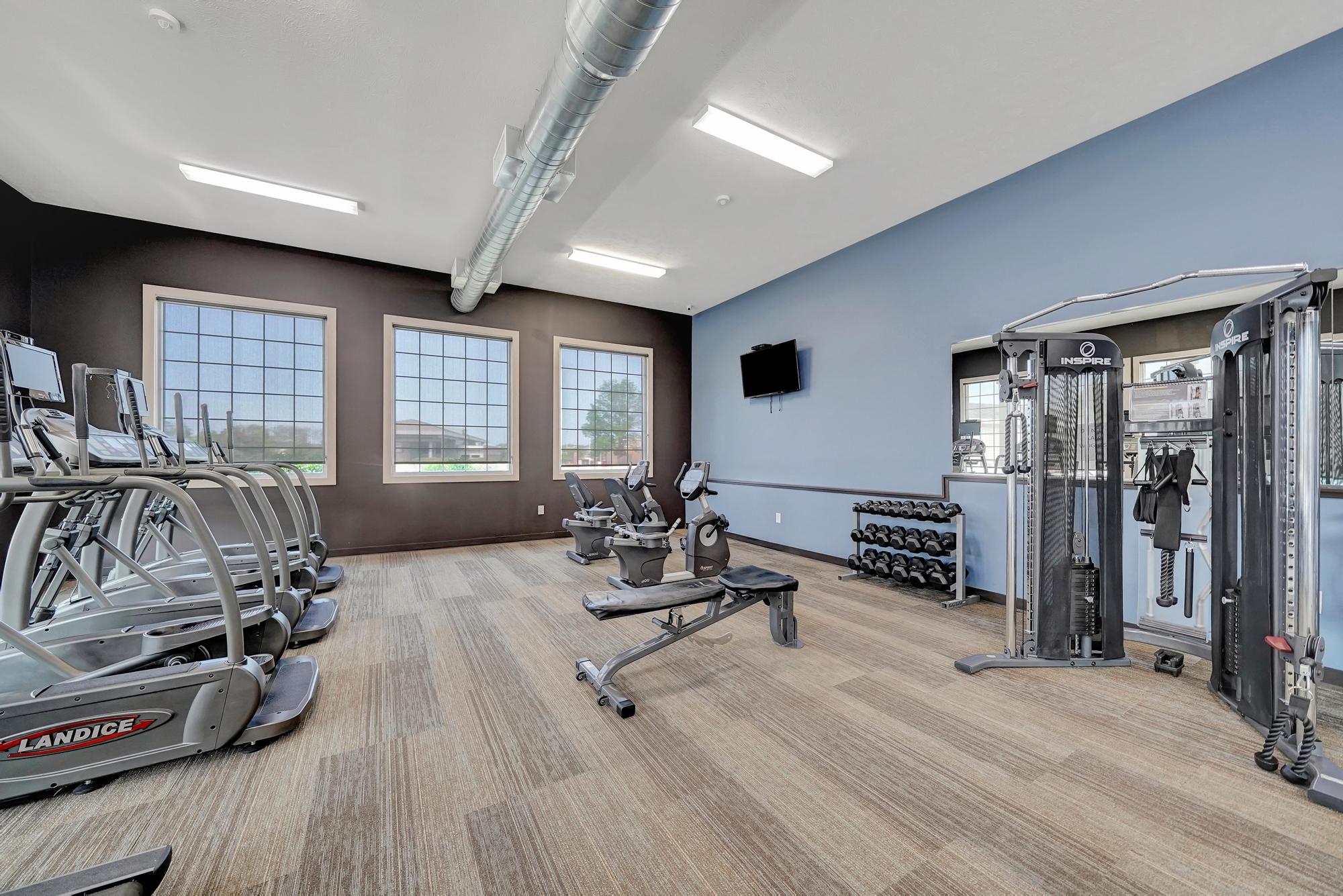 the gym at the preserve at polk apartments