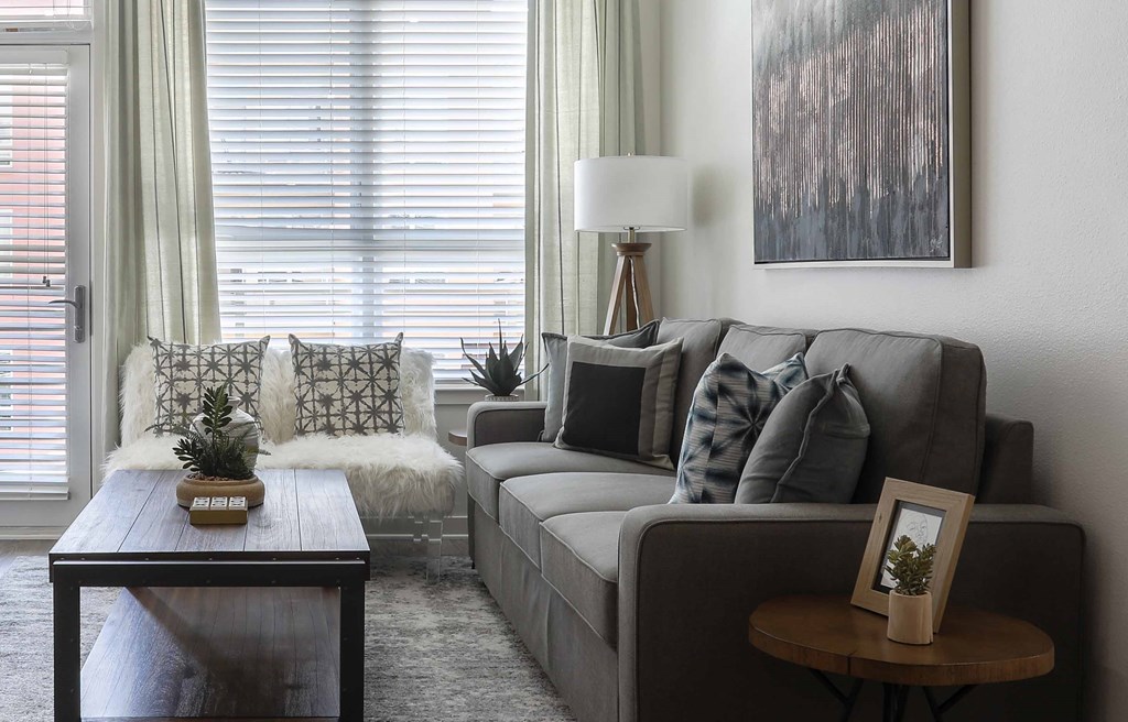 a living room with a couch and a coffee table