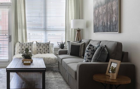a living room with a couch and a coffee table