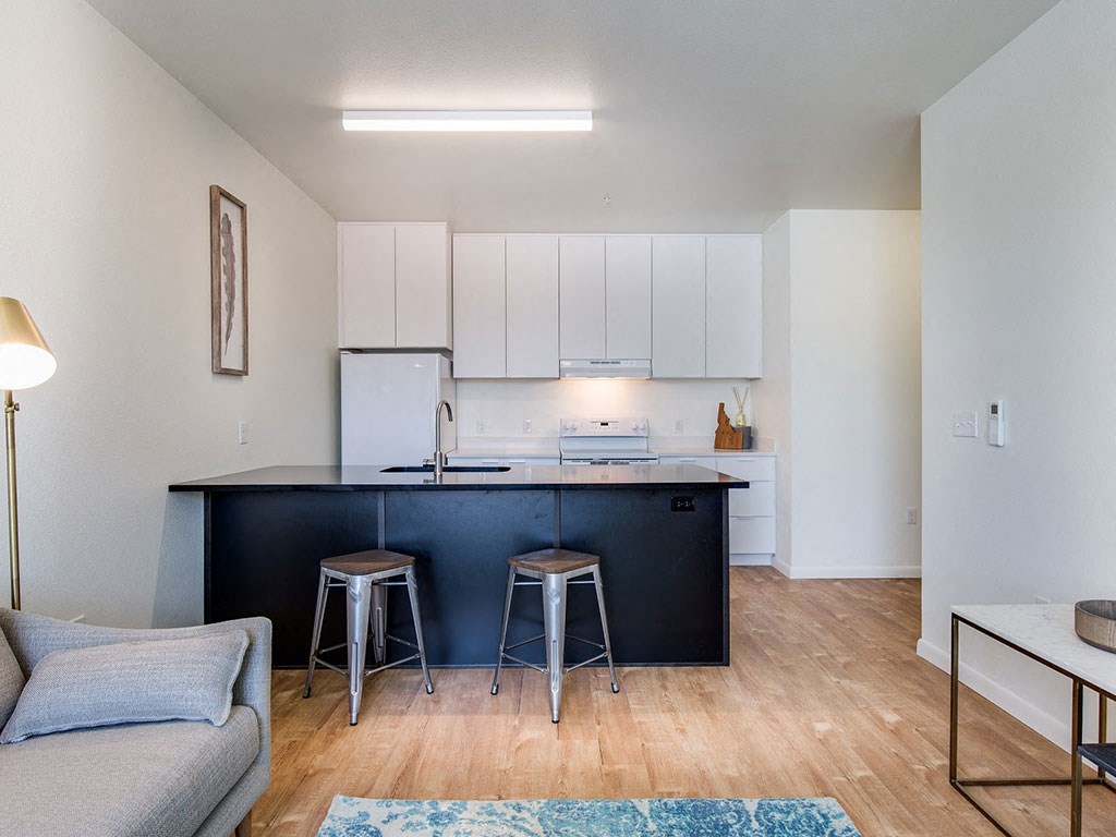 Fitted Kitchen With Island Dining at The Watercooler Apartments, Boise, ID, 83702