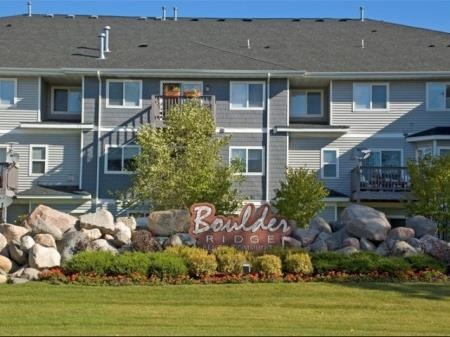 a large building with a sign in front of it