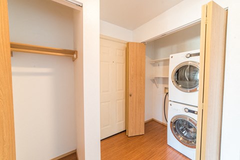 a laundry room with a washer and dryer in a closet