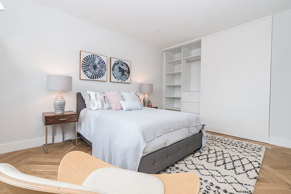 Bright one bedroom apartment with large custom built in closets