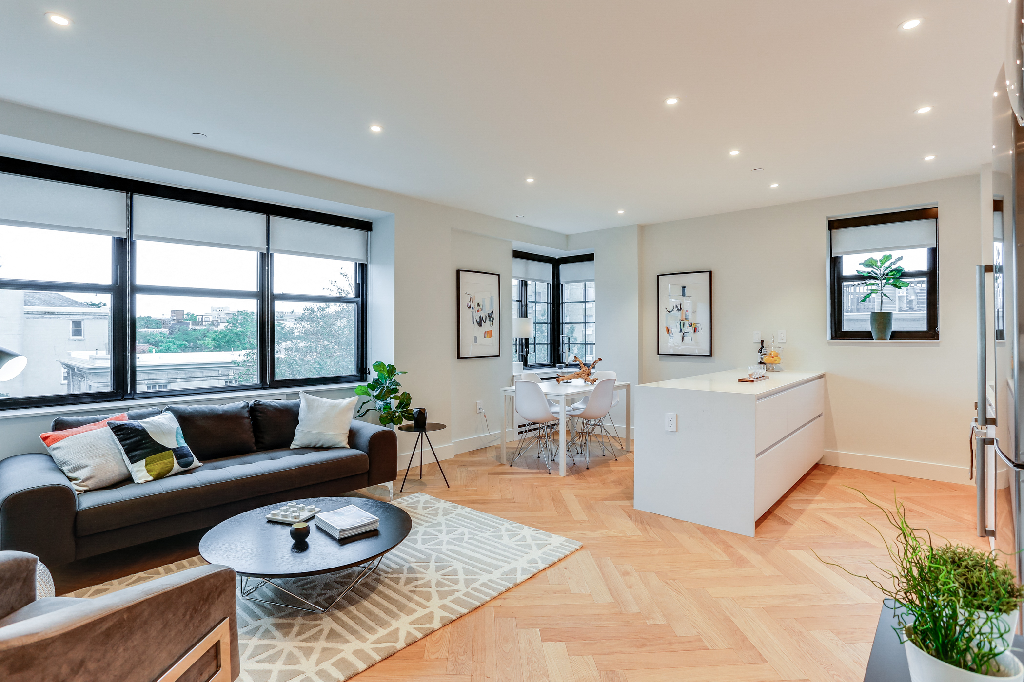 Open concept living and dining rooms with brand new hardwood flooring