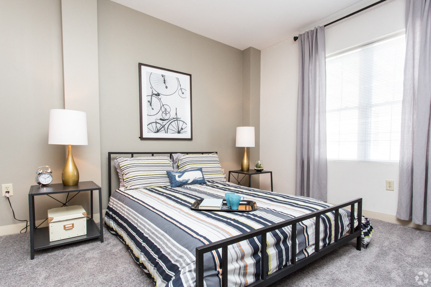 an example of a bedroom with a bed and a window