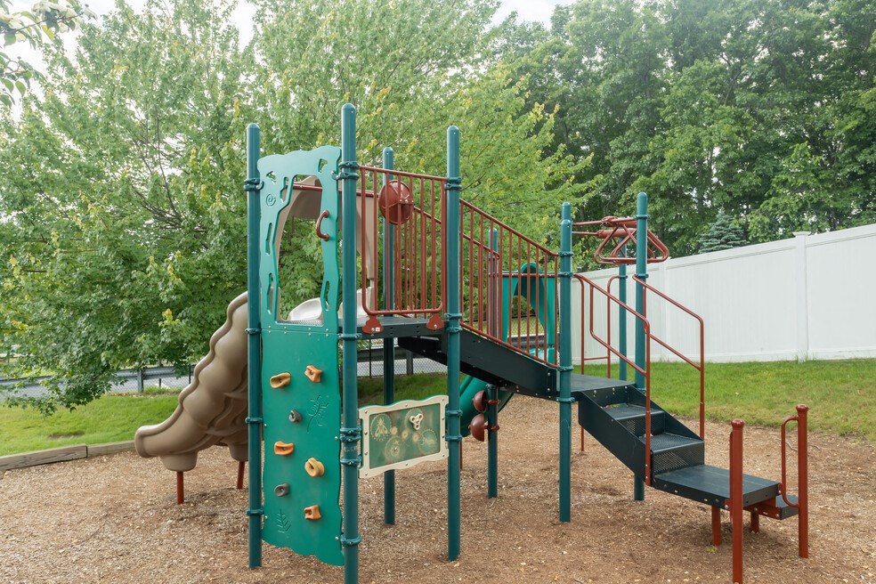a playground with a slide and stairs