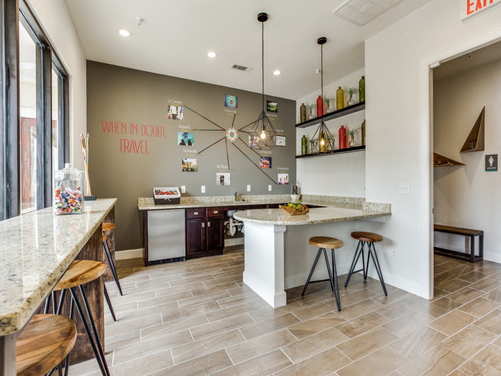 Gorgeous clubhouse with bar top seating overlooking the pool at CLEAR Property Management , The Lookout at Comanche Hill, Texas, 78247