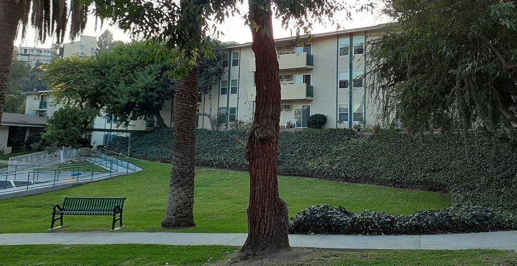 a park bench in front of a building