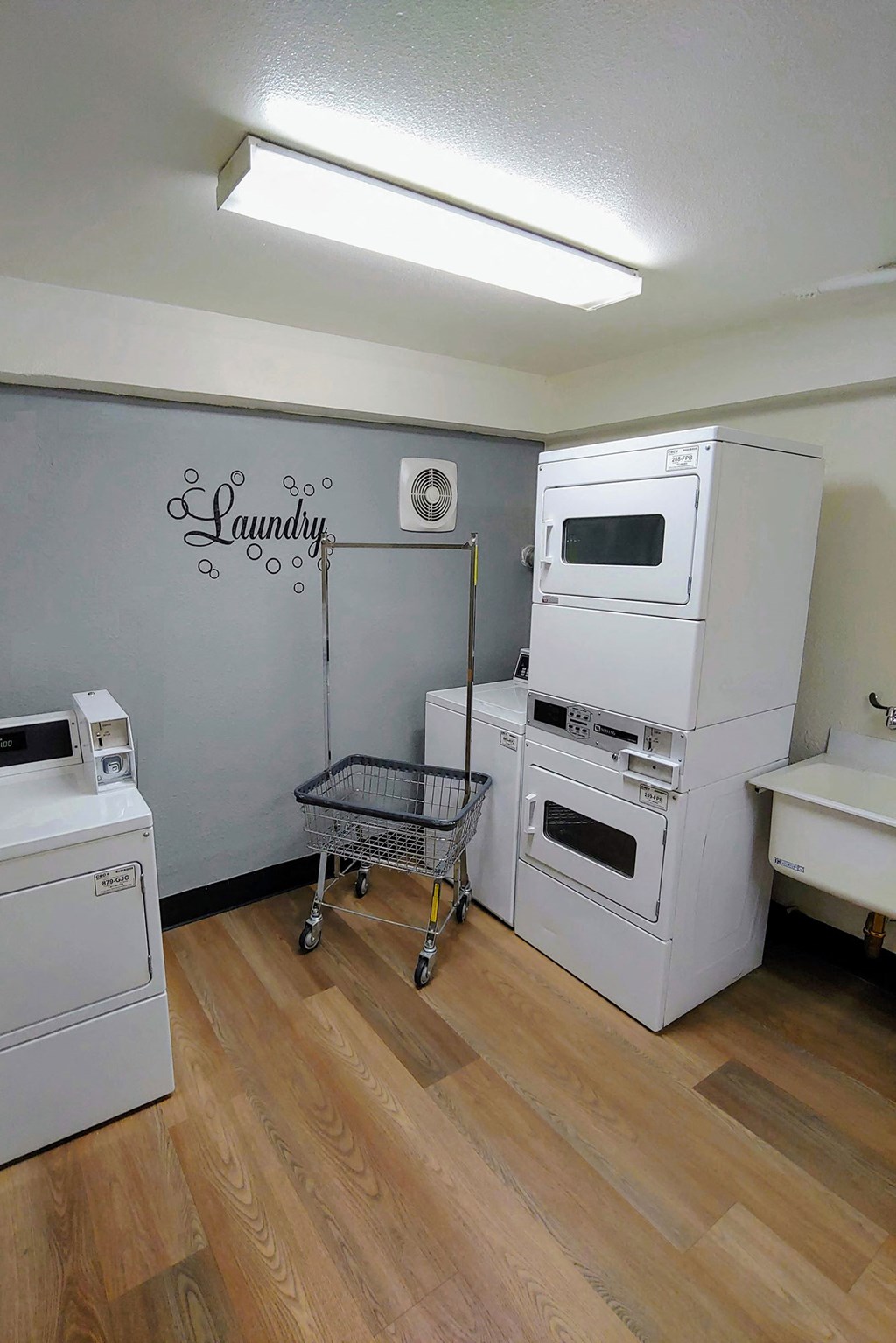 a kitchen with a stove and a refrigerator