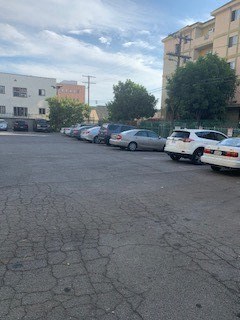 a bunch of cars parked in a parking lot