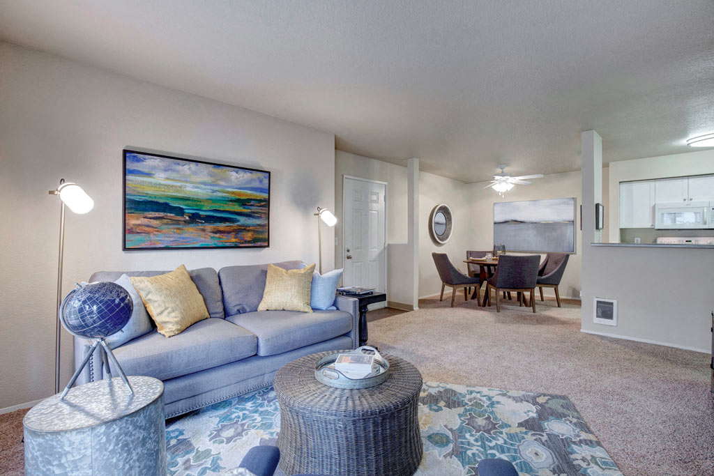 a living room with a couch and a table