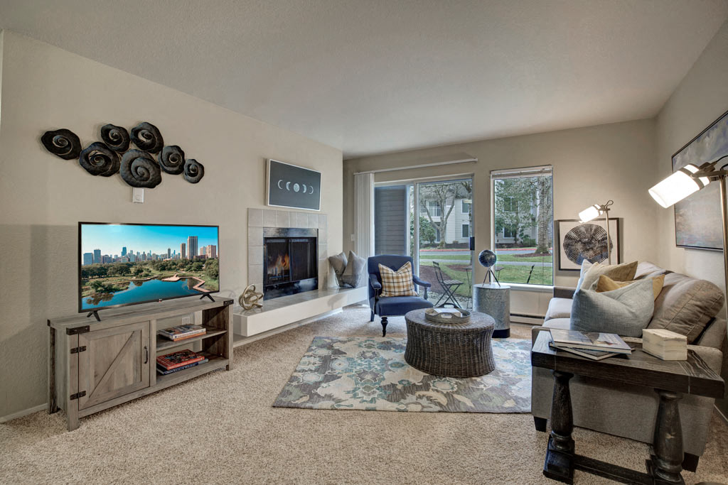 a living room with a couch and a tv