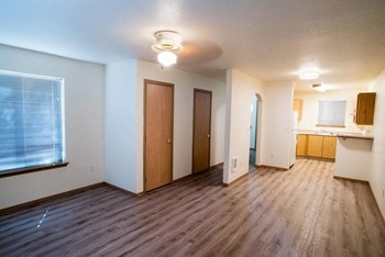 Wood Floor Living Room at Lorence Court Apartments, Portland, OR, 97216 - Photo Gallery 6