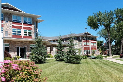 a large lawn in front of a building