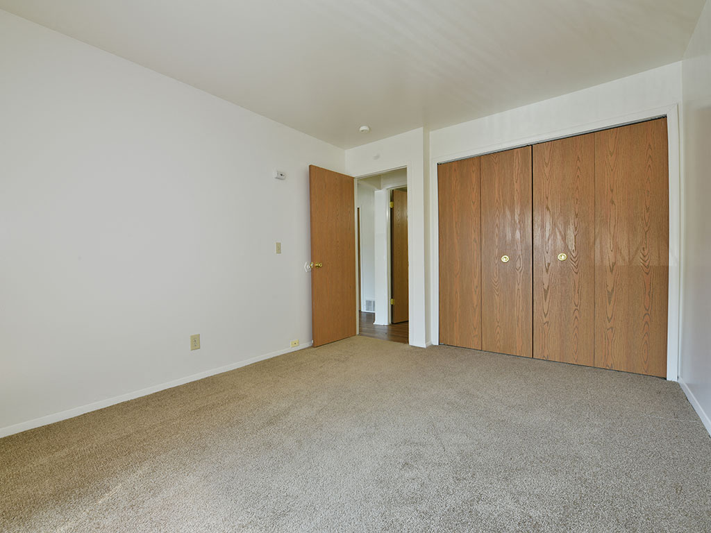 Bedroom with Large Closet at Woodland Place, Midland, 48640